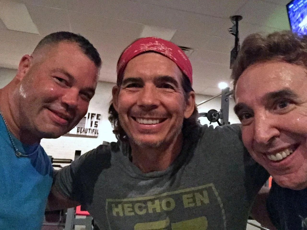 Jay Repko with clients in gym